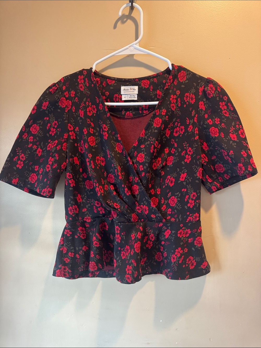 Anthropologie Black Wrap Peplum Blouse with Red Floral Print
